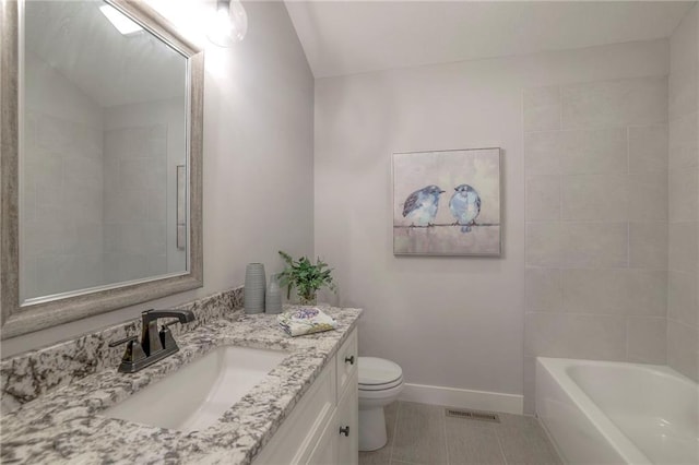 13812 Quigley St, Overland Park, KS 66221 - full bathroom featuring tile patterned floors, toilet, vanity, and baseboards
