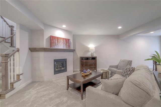 13812 Quigley St, Overland Park, KS 66221 - living room with recessed lighting, stairway, carpet, a tile fireplace, and baseboards