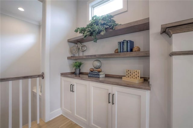 13812 Quigley St, Overland Park, KS 66221 - detailed view of wood finished floors, baseboards, and recessed lighting