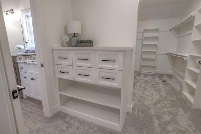 13812 Quigley St, Overland Park, KS 66221 - spacious closet featuring light carpet