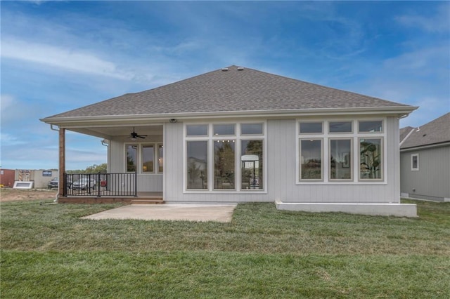 13812 Quigley St, Overland Park, KS 66221 - rear view of property with a ceiling fan, a lawn, a patio, and roof with shingles