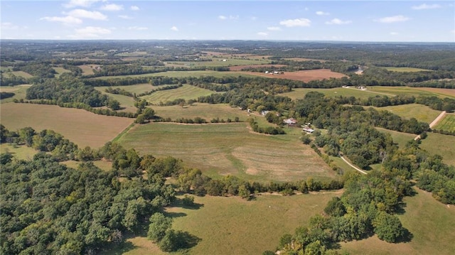 birds eye view of property featuring a rural view