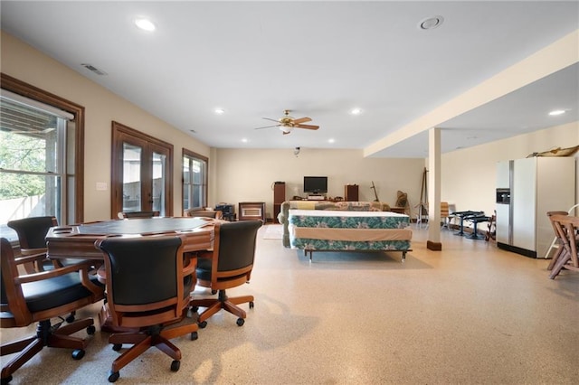 interior space featuring french doors and ceiling fan