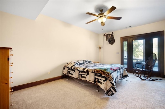 bedroom with ceiling fan, light carpet, and access to exterior