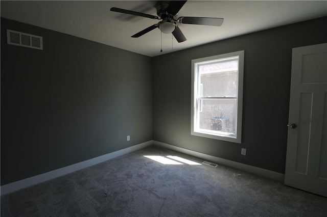 empty room with carpet floors and ceiling fan