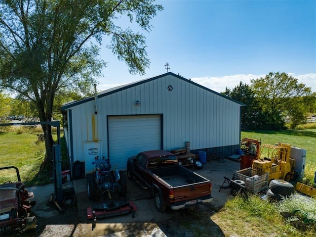 garage with a lawn