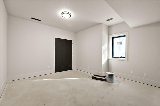 111 Teton Rdg, Lake Winnebago, MO 64034 - unfurnished bedroom featuring baseboards and concrete floors