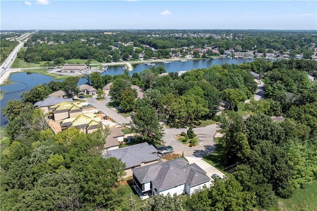 bird's eye view with a water view