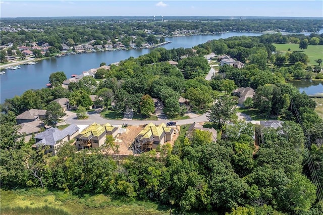 115 Teton Rdg, Lake Winnebago, MO 64034 - view of property location featuring a large body of water and a tree filled landscape