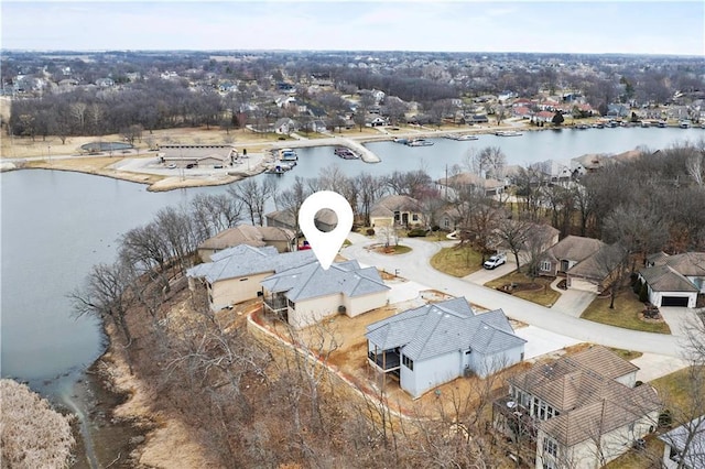 aerial view with a water view and a residential view