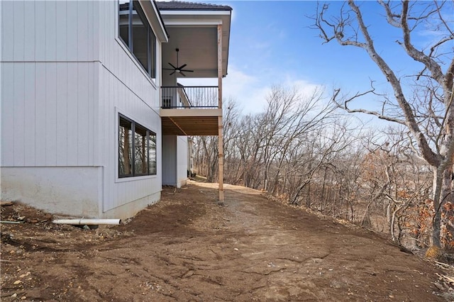 view of property exterior with ceiling fan