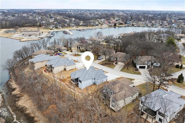 aerial view with a water view and a residential view