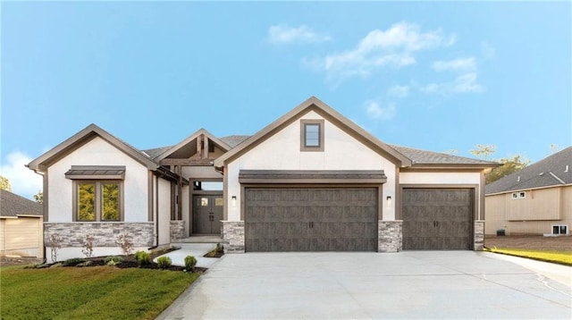 view of front facade with an attached garage, stone siding, driveway, and stucco siding