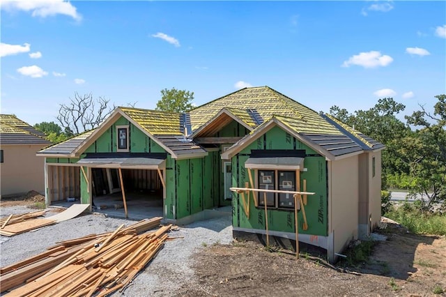 exterior space featuring a carport and driveway