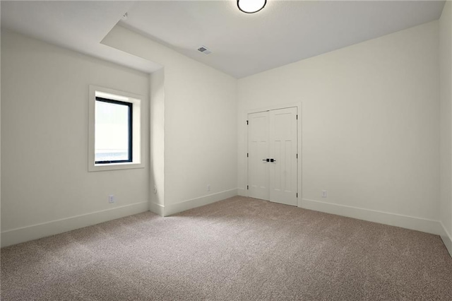 119 Teton Rdg, Lake Winnebago, MO 64034 - unfurnished room featuring light colored carpet and baseboards