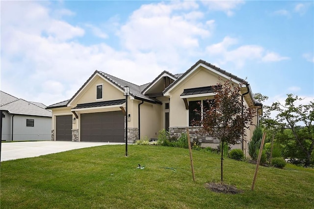 119 Teton Rdg, Lake Winnebago, MO 64034 - view of front facade featuring a standing seam roof, a front lawn, driveway, a garage, and stone siding