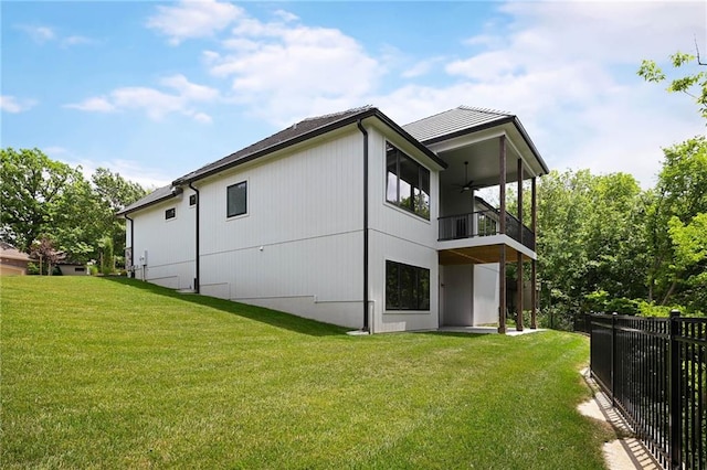 119 Teton Rdg, Lake Winnebago, MO 64034 - rear view of property featuring a balcony and ceiling fan