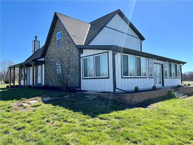 view of property exterior with a lawn