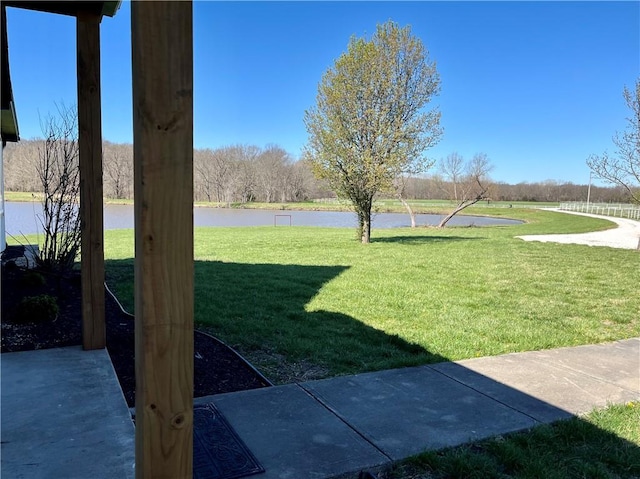 view of yard with a water view