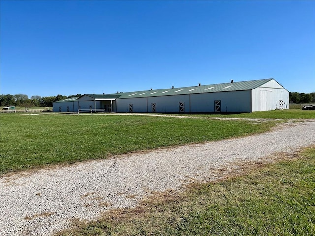 exterior space featuring a front yard