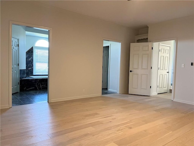 empty room with light wood-type flooring