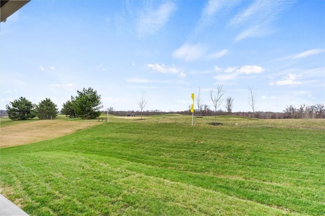 view of yard with a rural view