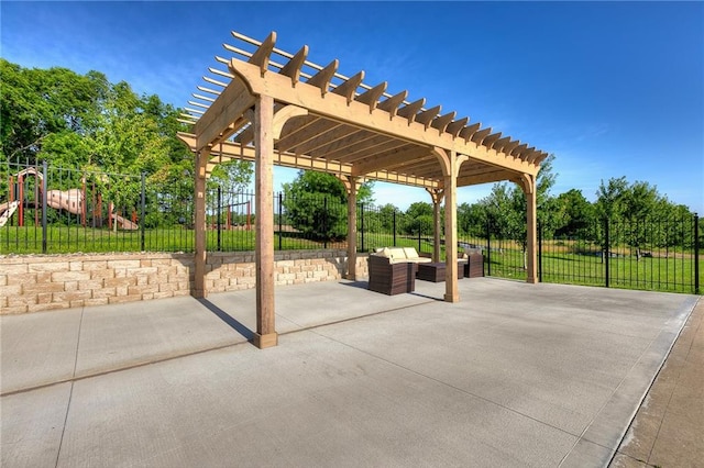 view of terrace featuring a playground and a pergola