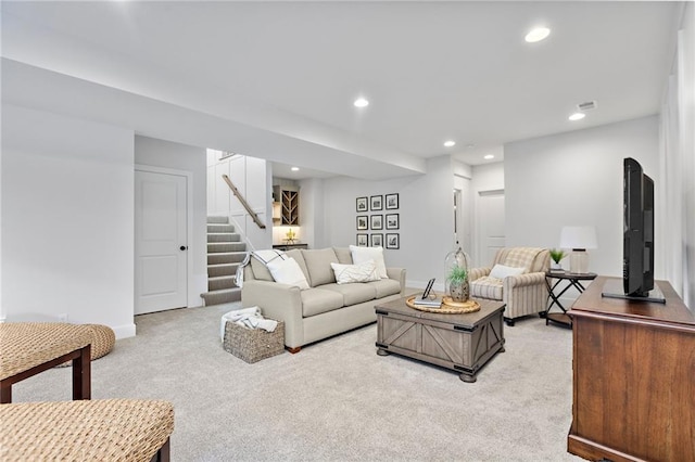 20132 Barker St, Spring Hill, KS 66083 - living area featuring light colored carpet, recessed lighting, and stairs