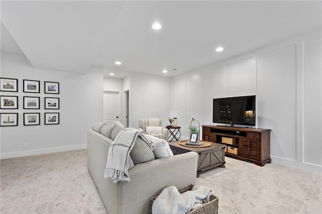 20132 Barker St, Spring Hill, KS 66083 - living area with light colored carpet, recessed lighting, and a decorative wall