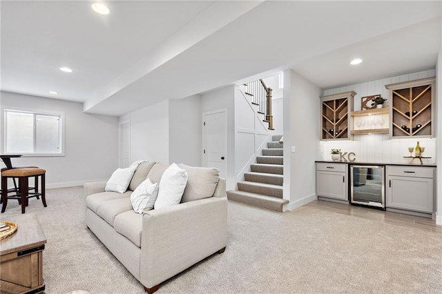 20132 Barker St, Spring Hill, KS 66083 - living area featuring wine cooler, a dry bar, light carpet, recessed lighting, and stairway