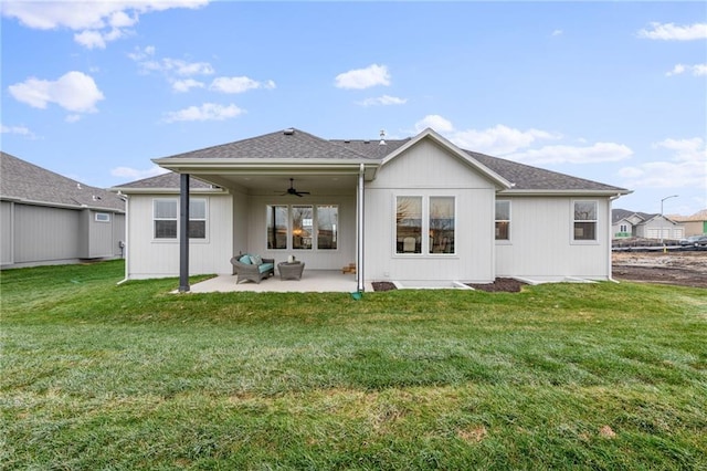 20132 Barker St, Spring Hill, KS 66083 - back of property featuring a ceiling fan, a patio, and a yard
