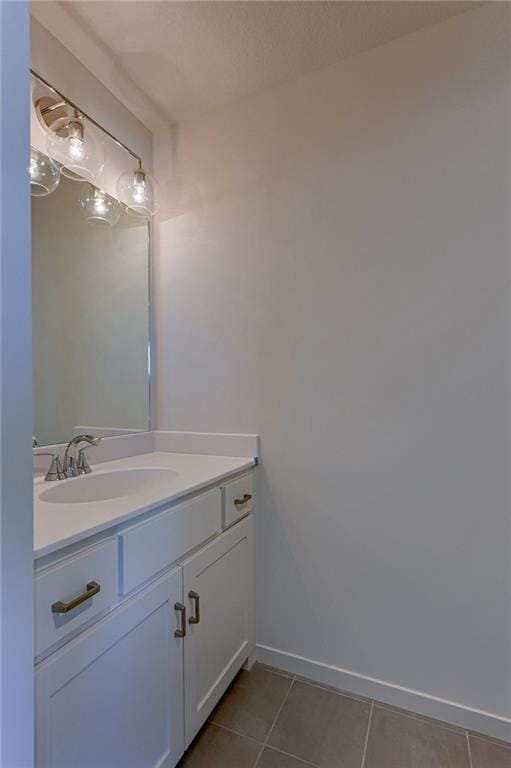 bathroom featuring vanity and tile patterned floors