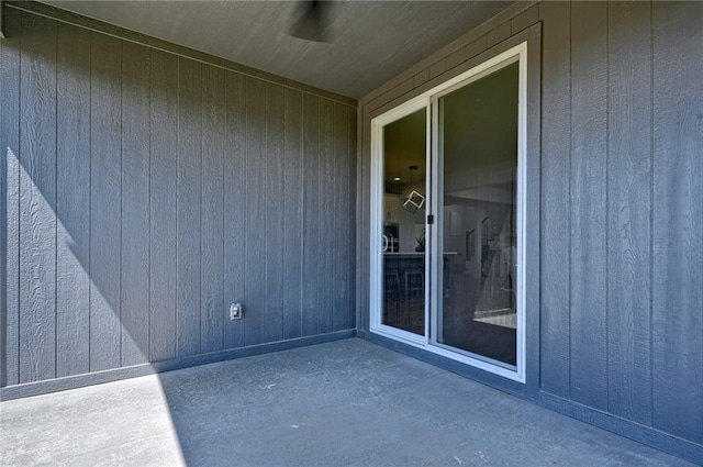 property entrance with a patio