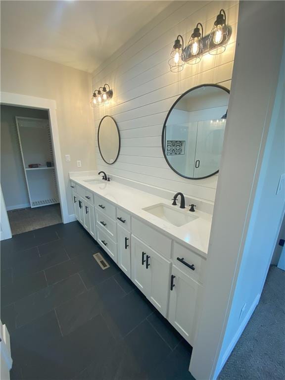 bathroom featuring vanity and tile patterned flooring