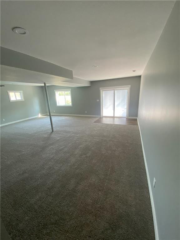 spare room featuring carpet floors