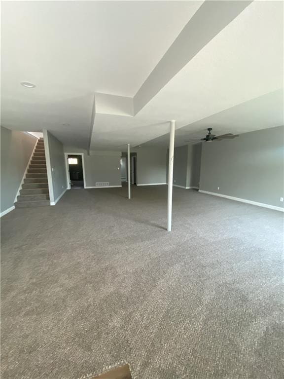 basement featuring ceiling fan