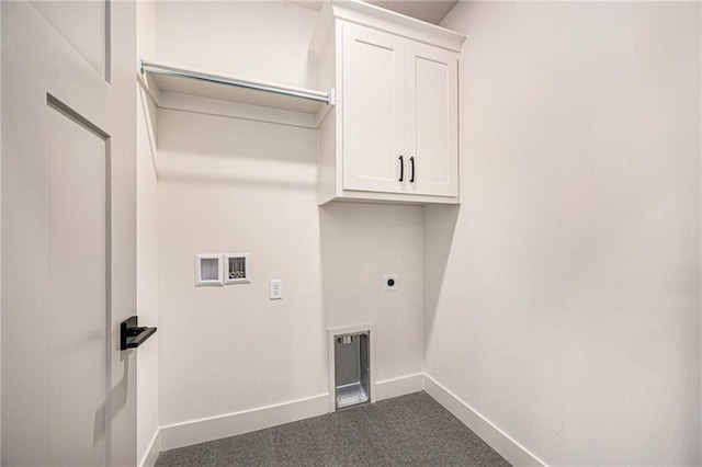 clothes washing area featuring cabinet space, baseboards, dark colored carpet, hookup for an electric dryer, and washer hookup