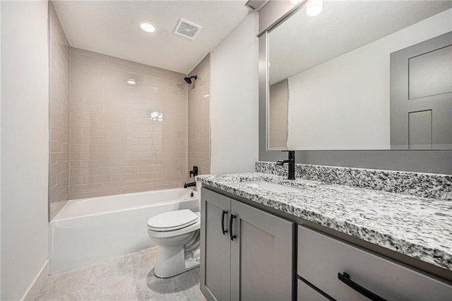 bathroom with toilet, shower / washtub combination, vanity, and visible vents