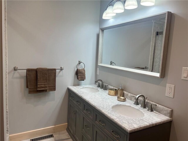 bathroom with double vanity