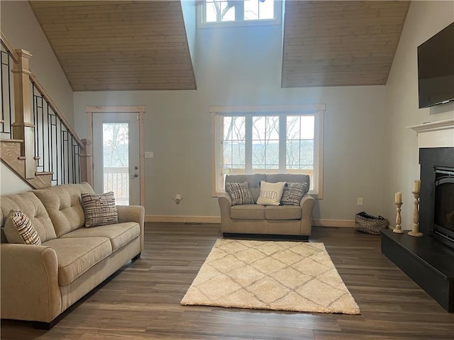 living room with high vaulted ceiling, dark hardwood / wood-style flooring, and wood ceiling