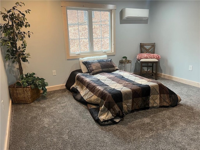 bedroom with carpet flooring and a wall mounted air conditioner