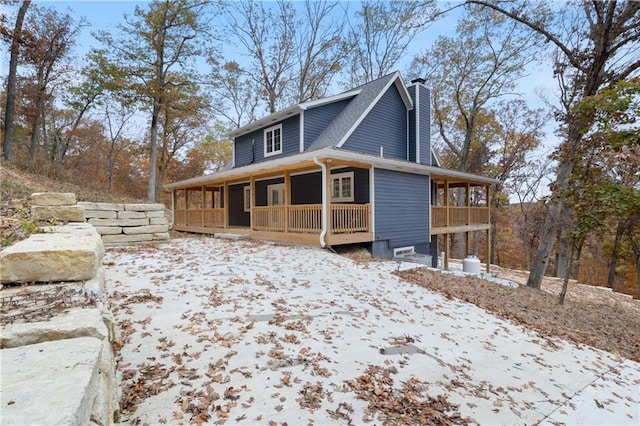 7930 Eagle Bay Dr, Gravois Mills, MO 65037 - view of front facade with a porch and a chimney