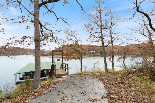 7930 Eagle Bay Dr, Gravois Mills, MO 65037 - view of dock featuring a water view
