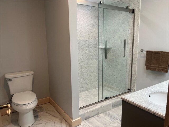7930 Eagle Bay Dr, Gravois Mills, MO 65037 - full bathroom featuring baseboards, toilet, a shower stall, vanity, and marble finish floor