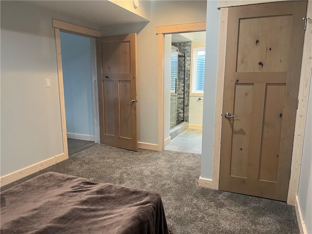 7930 Eagle Bay Dr, Gravois Mills, MO 65037 - bedroom featuring ensuite bath, baseboards, and carpet floors