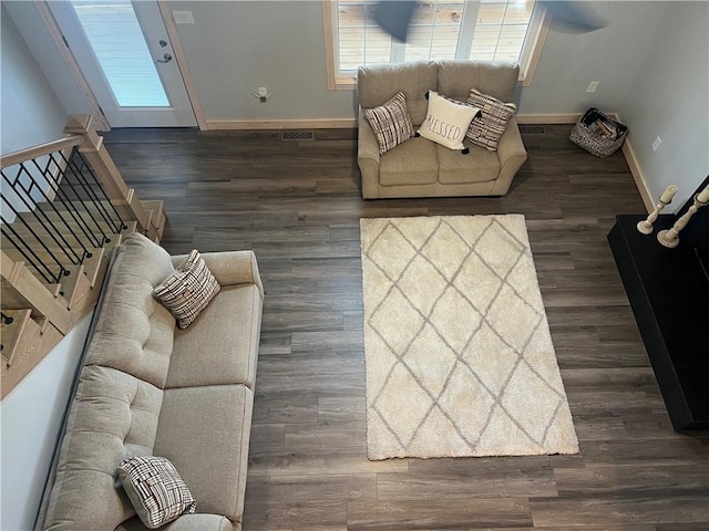 7930 Eagle Bay Dr, Gravois Mills, MO 65037 - living area with baseboards, stairs, and dark wood finished floors