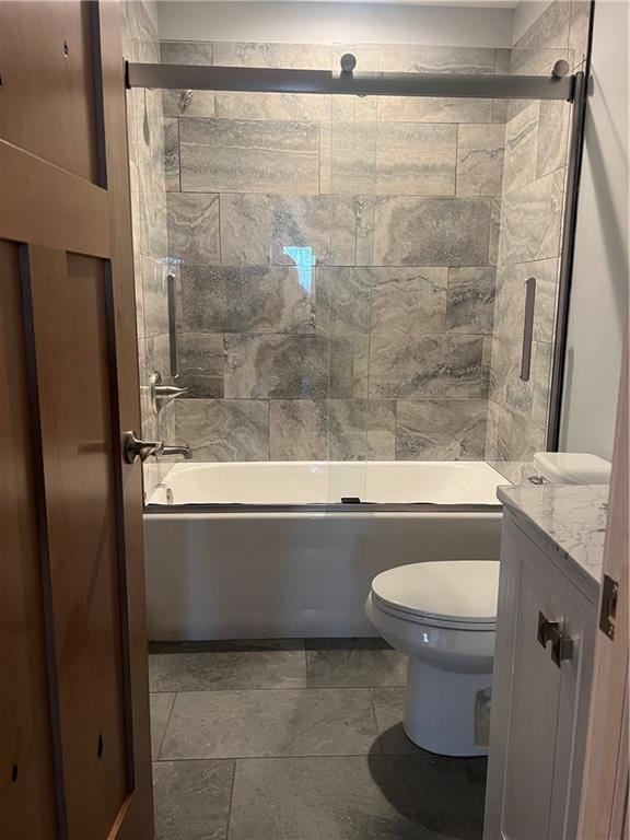 7930 Eagle Bay Dr, Gravois Mills, MO 65037 - full bath featuring stone finish flooring, toilet, combined bath / shower with glass door, and vanity