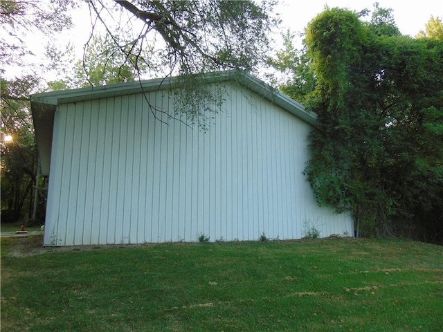 view of home's exterior featuring a lawn