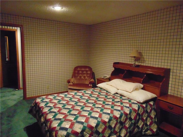 carpeted bedroom with a textured ceiling