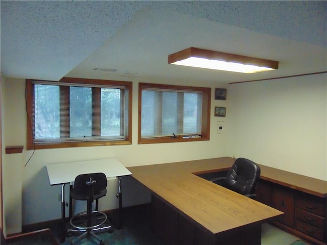 office area featuring a textured ceiling